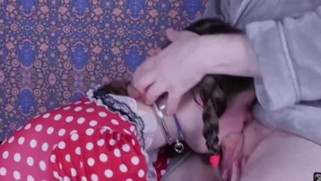 Teen slave Anastasia Rose deep throats and gives a facial