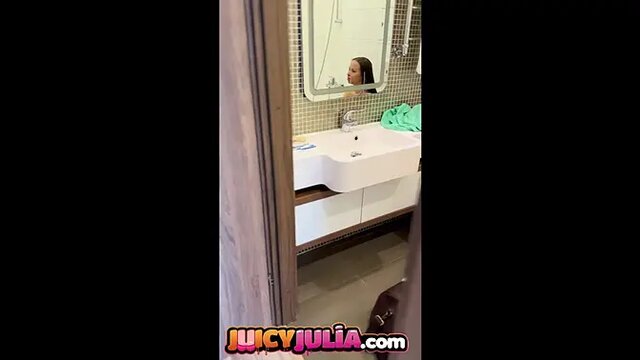 Teen brunette with tattoos pees and shows huge boobs