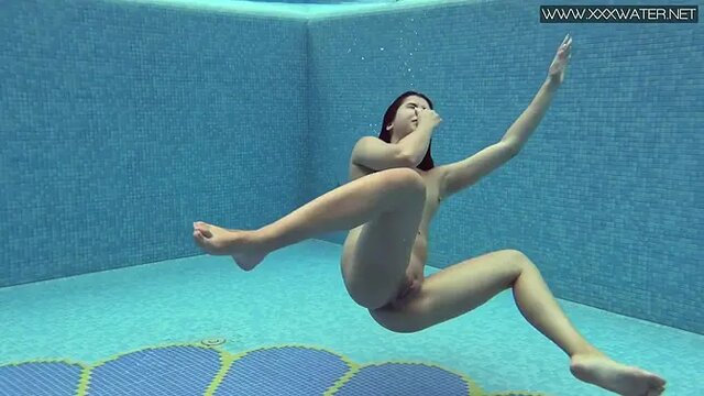 Lady Dee's Juicy Body Glows Underwater in Public Pool